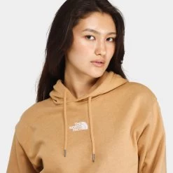 The North Face Women's Evolution Hi-Lo Pullover Hoodie / Almond Butter -Sports Fashion Clothing Store NF0A84GT I0J tnf women s evolution hi lo hoodie B