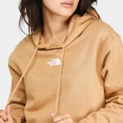 The North Face Women's Evolution Hi-Lo Pullover Hoodie / Almond Butter -Sports Fashion Clothing Store NF0A84GT I0J tnf women s evolution hi lo hoodie D